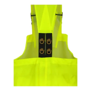 Gros plan sur la fixation des bretelles croisées à l'arrière de la cotte jaune fluo